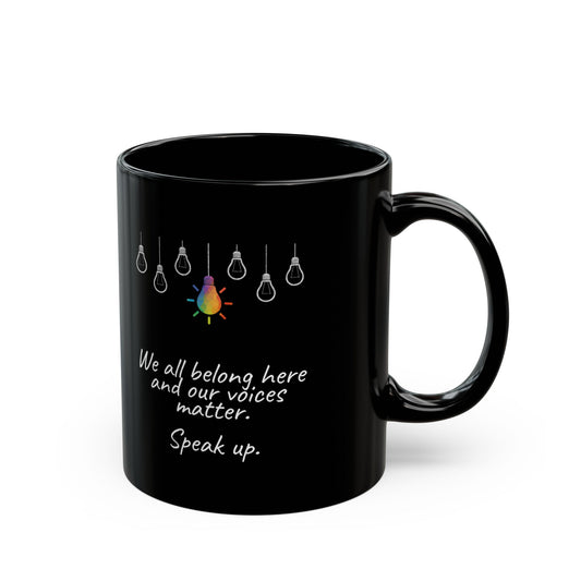 "We all belong here and our voices matter. Speak up." Black Mug